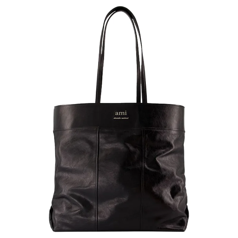 Small leather purses with zipper pockets-North South Shopper Bag - AMI Paris - Leather - Black